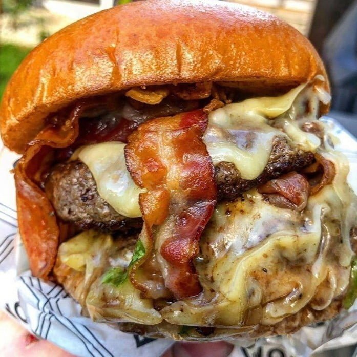 Bacon and beef burger with gooey cheese